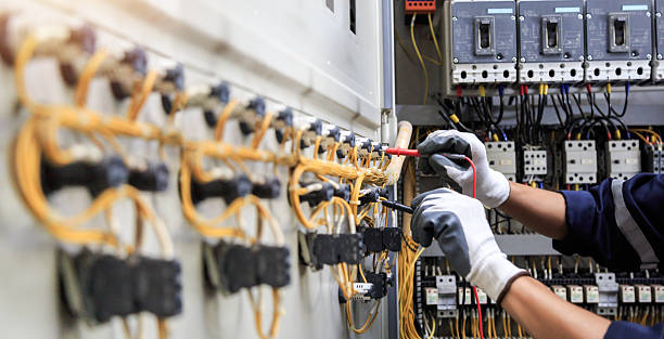 Professional Electrician technician working in Olivette, MO